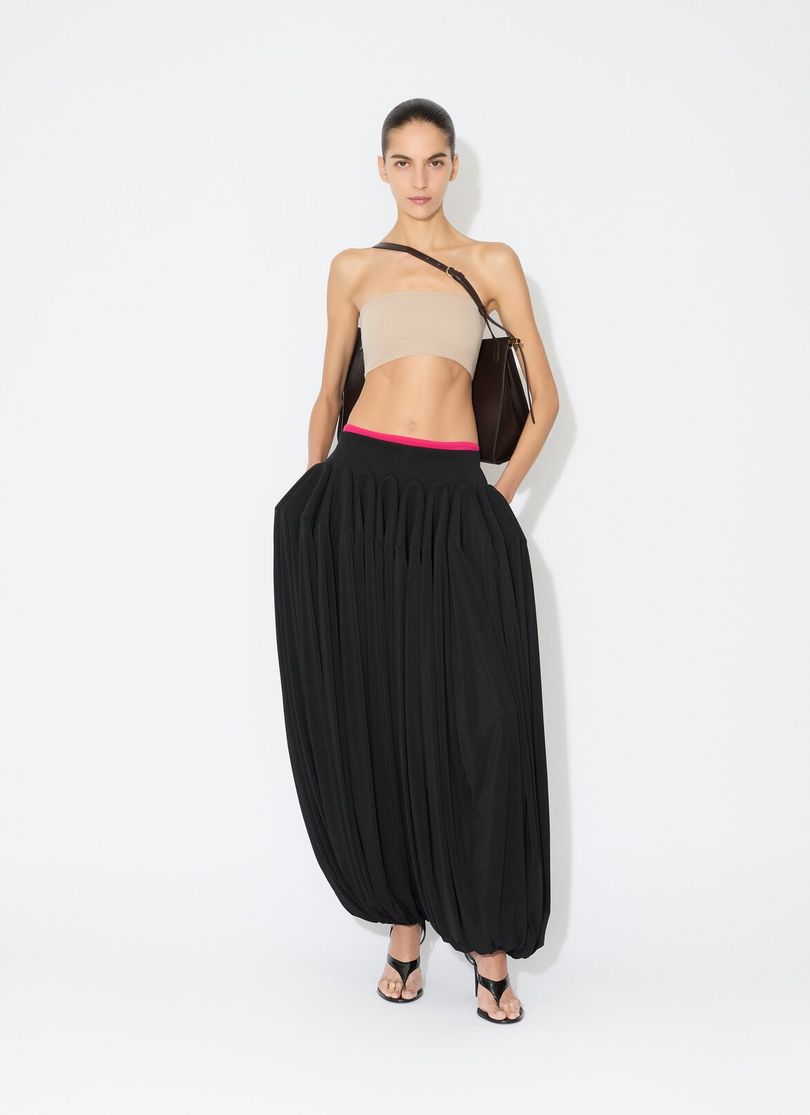 PANTALONI PEPLUM IN JERSEY ALAÏA PANTALONI PEPLUM IN JERSEY NERO